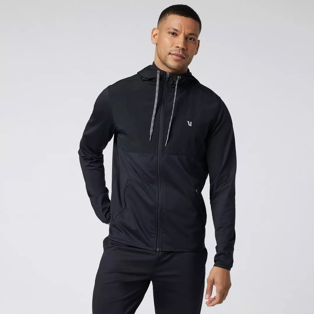 black Vuori lightweight jacket with drawstring hood